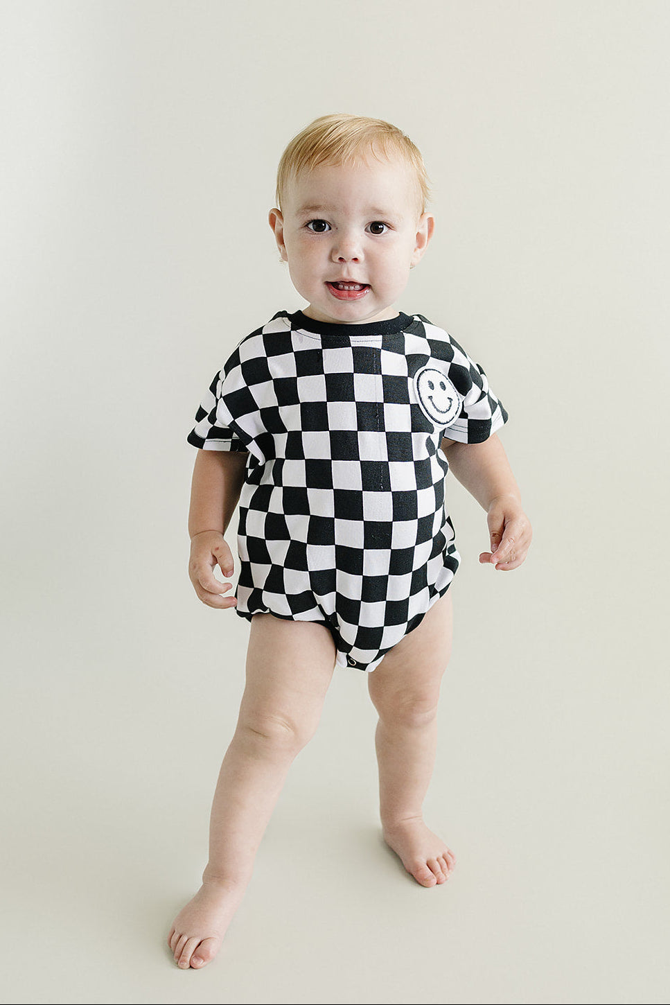 Short Sleeve Bubble Romper | Checkered Smiley Black