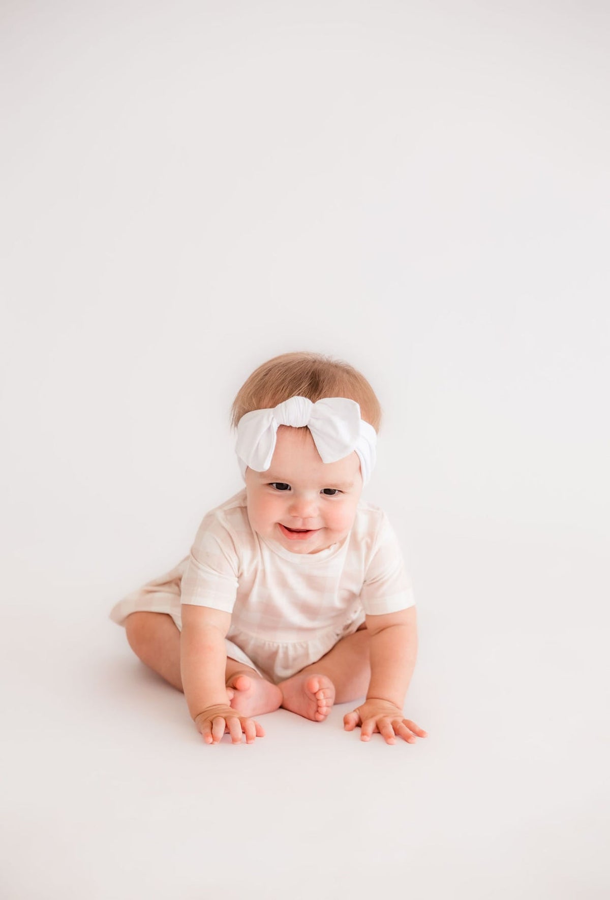 Neutral Gingham Twirl Bodysuit Romper