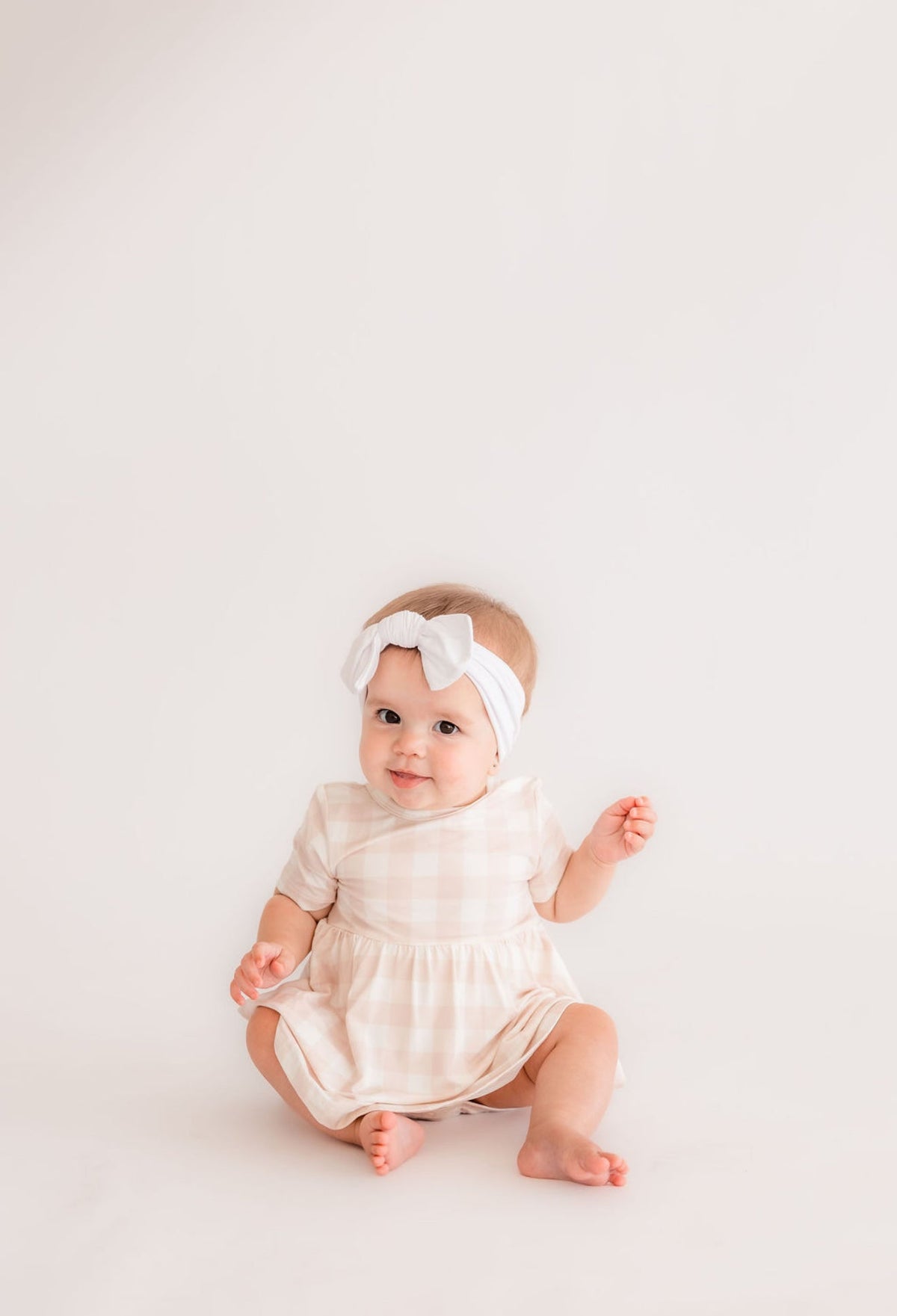 Neutral Gingham Twirl Bodysuit Romper