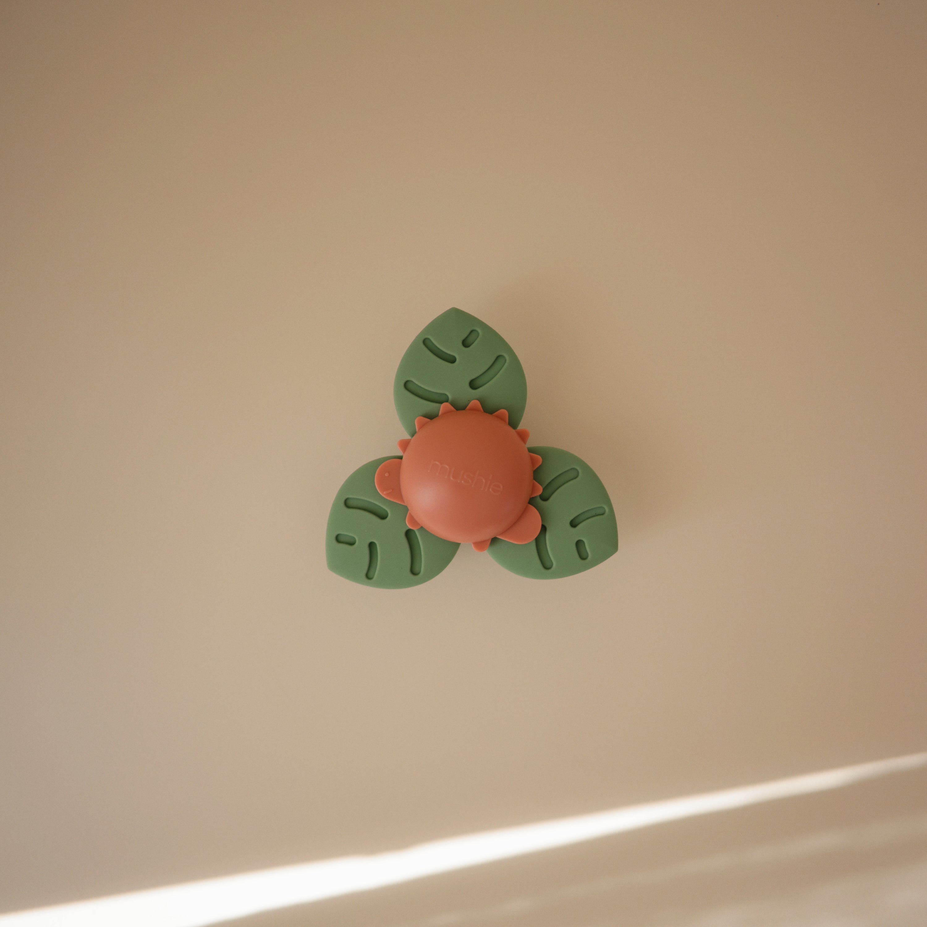 Dino Suction Spinner Toy Suction Spinner Toy Mushie