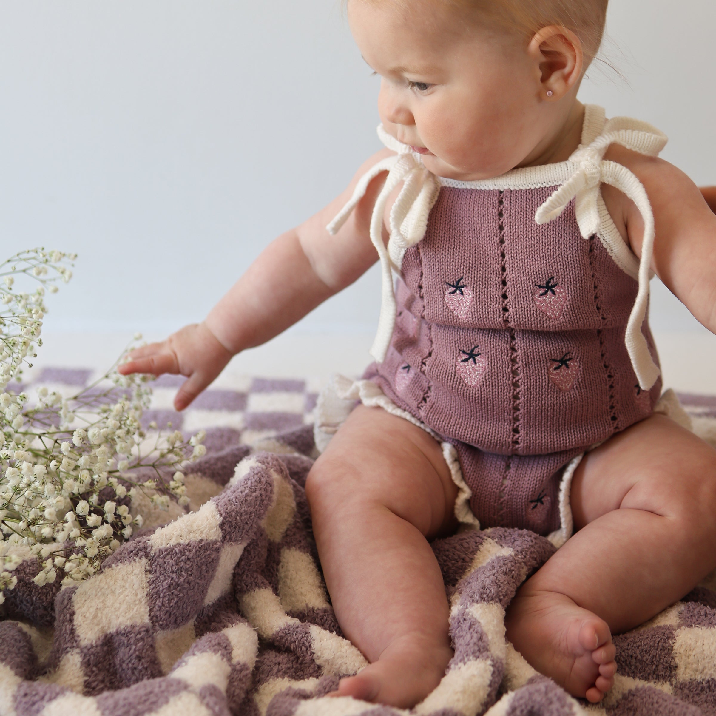 Ruffles baby knit romper