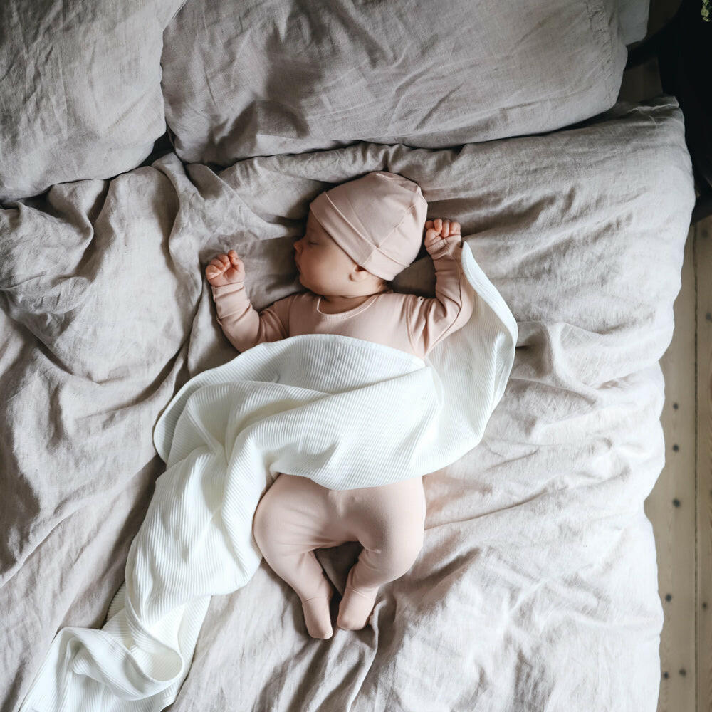 The Snap Romper - Blush Front Snap Romper Lovely Littles