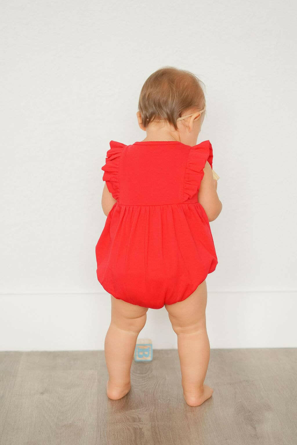 Betsy Romper in Scarlet romper Ollie Jay