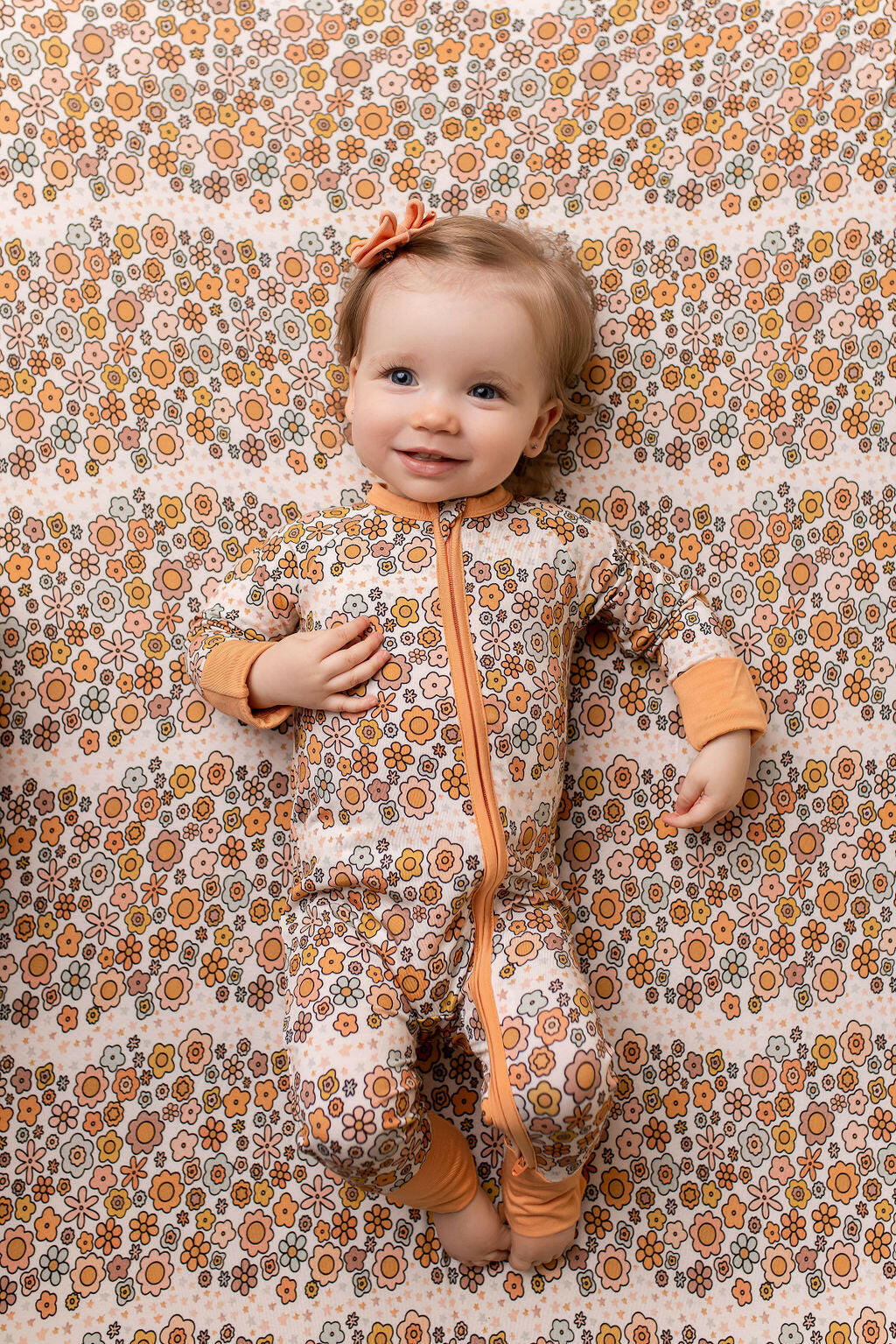 Oopsie Daisy Crib Sheet In my Jammers
