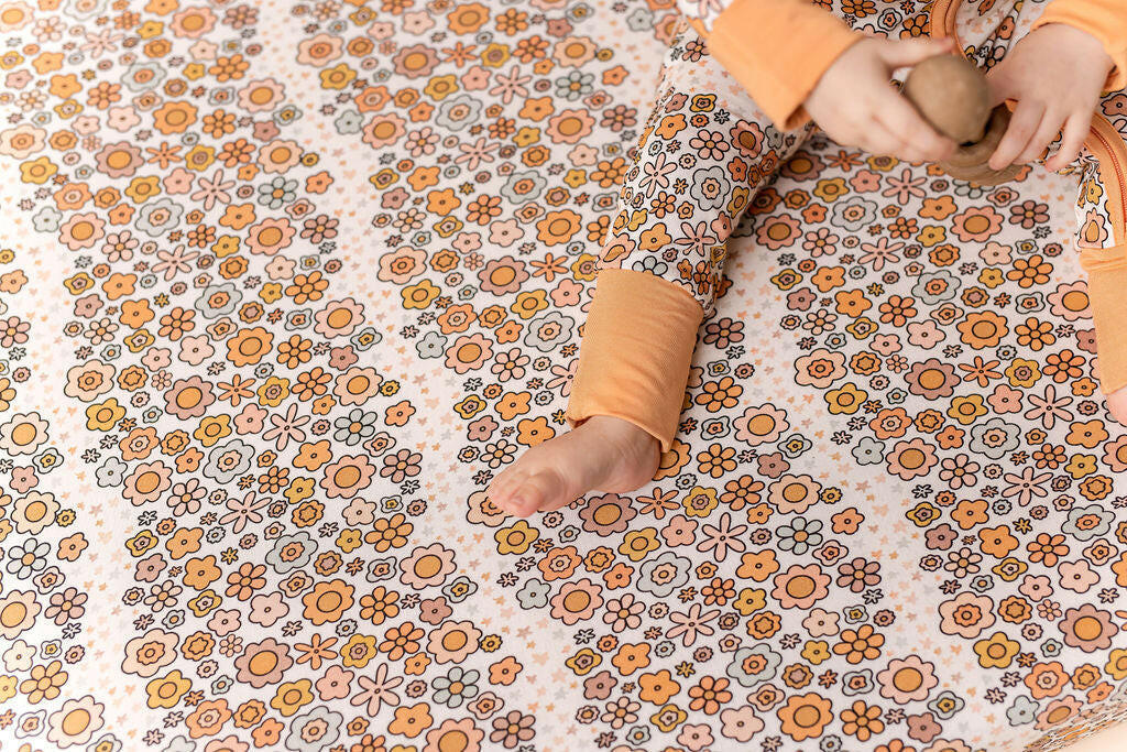 Oopsie Daisy Crib Sheet In my Jammers