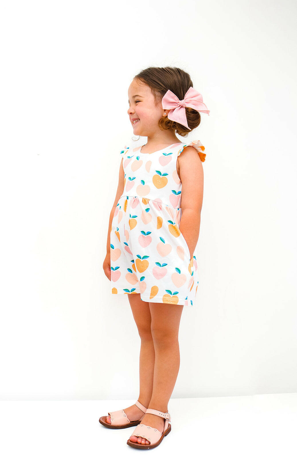 Macie Romper in Sweet Peach Ollie Jay