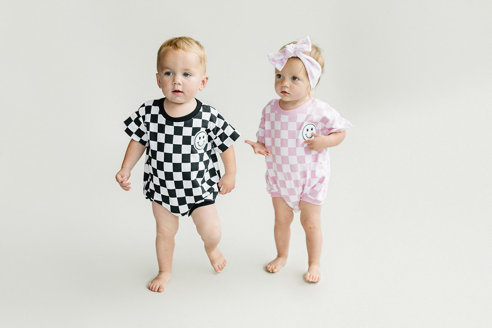 Short Sleeve Bubble Romper | Checkered Smiley Black