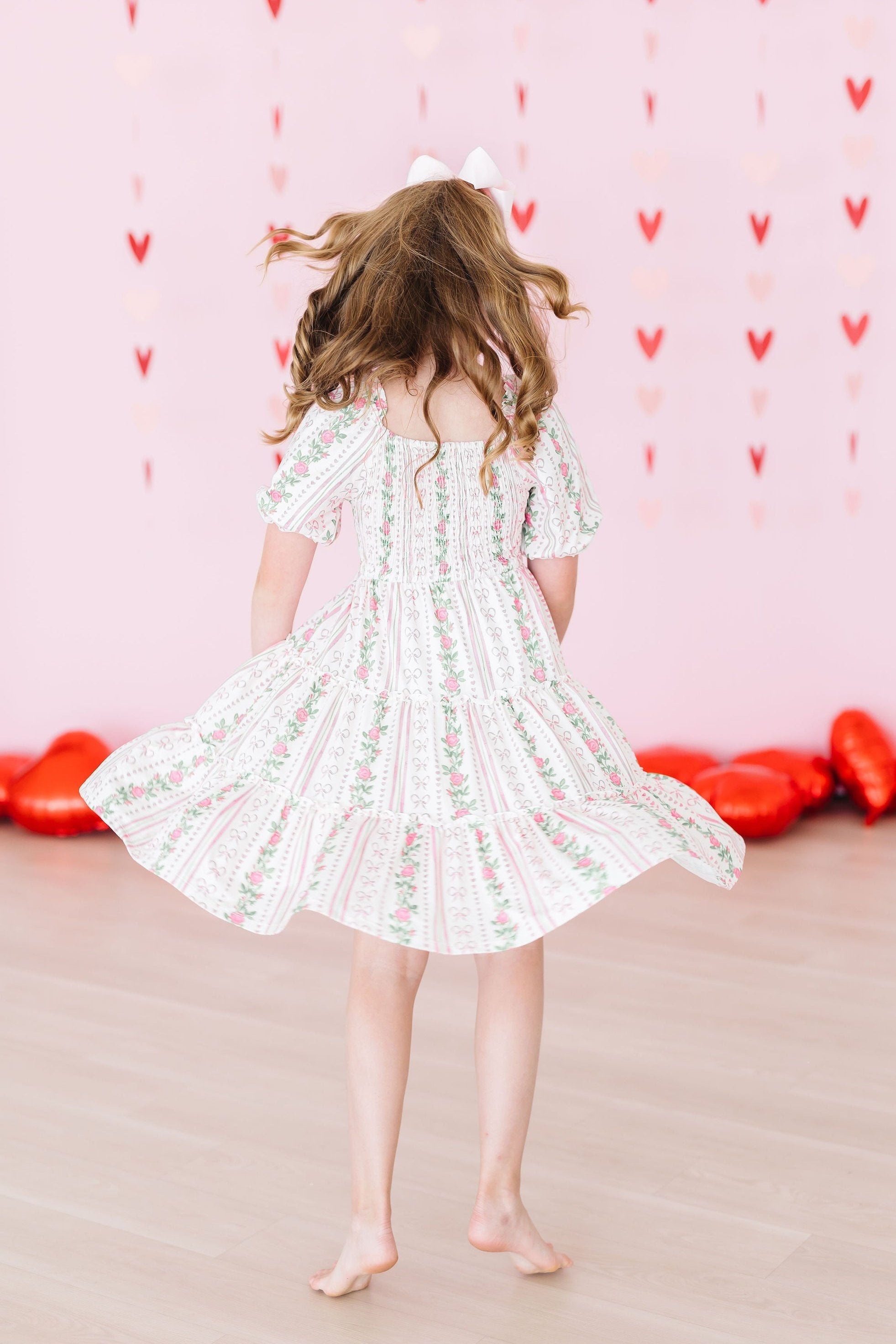 Rosebud Bows Smocked Ruffle Dress