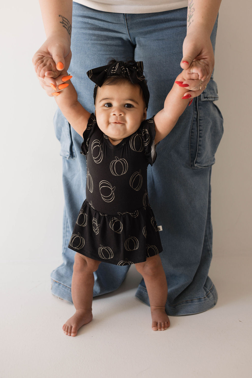 Bamboo Ruffle Romper | Midnight Pumpkin