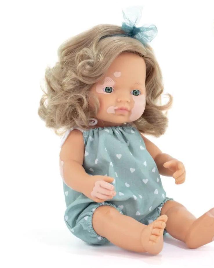 Baby girl doll with vitiligo