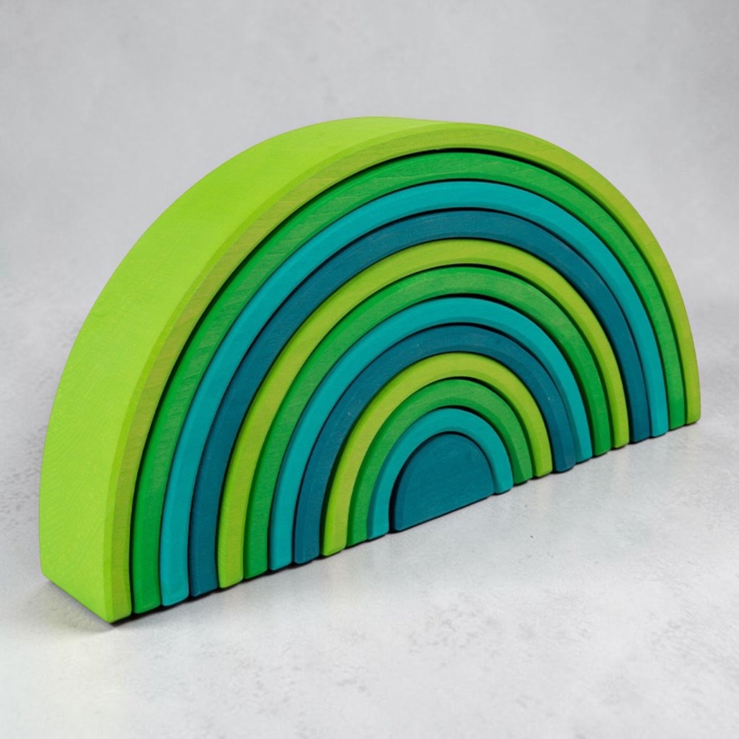 **Pre-order (Ships in 2-3 Weeks)**12-Piece Stained Large Basswood Rainbow Stacking Blocks | Meadow Green & Forest Green