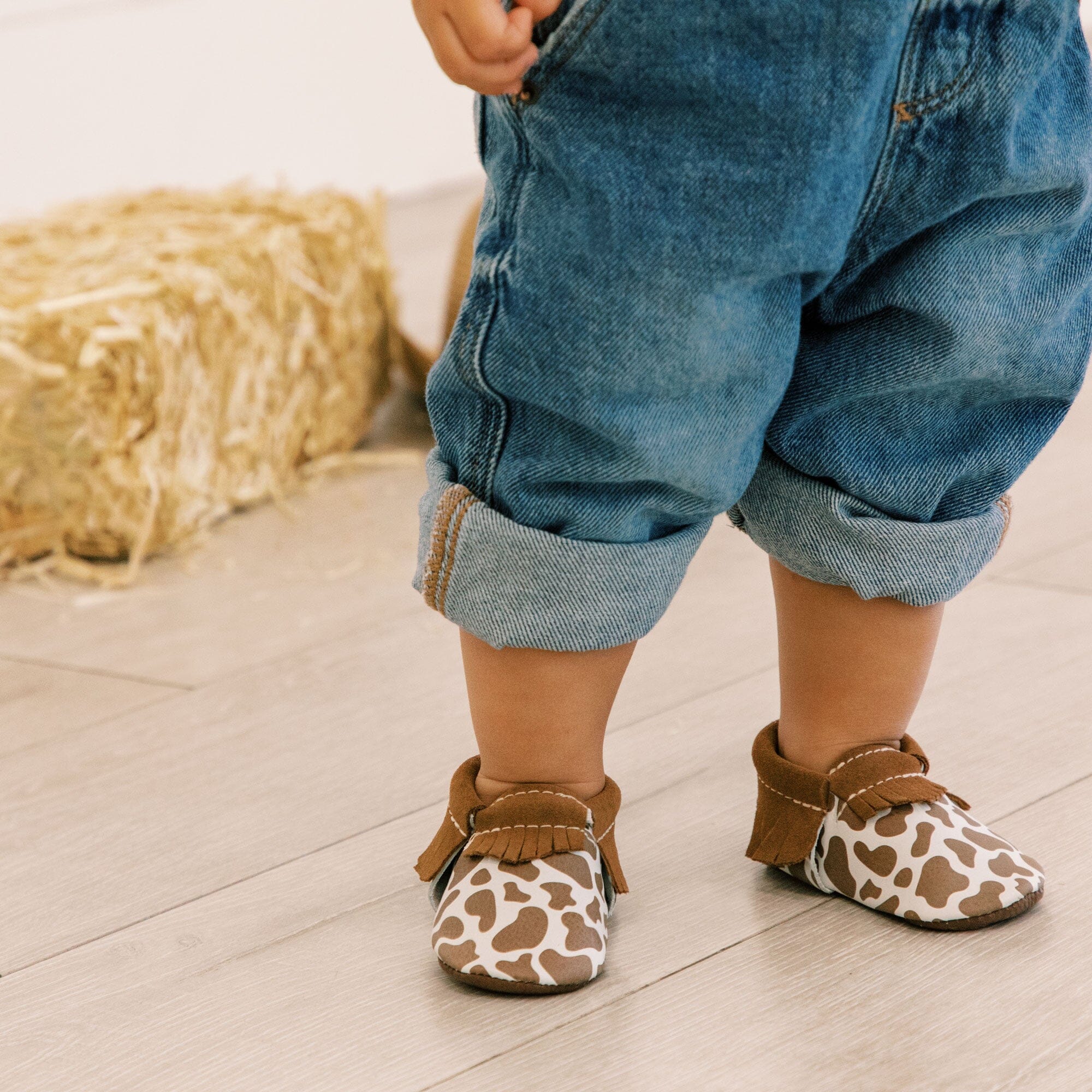 Suede Cow Print Moccasin Baby Shoe