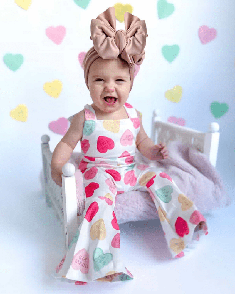 Andi Pleated Bell Bottom Jumpsuit - Conversation Hearts