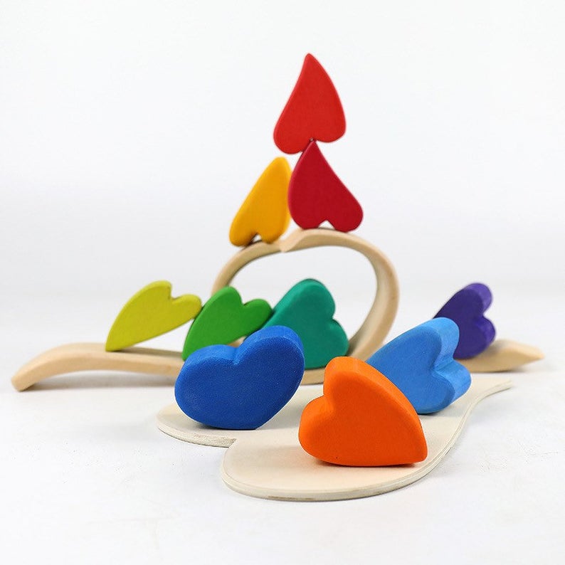 **Pre-order (Ships in 1-2 Weeks)**10-Piece Stained Wooden Rainbow Heart Stacking Puzzle Blocks