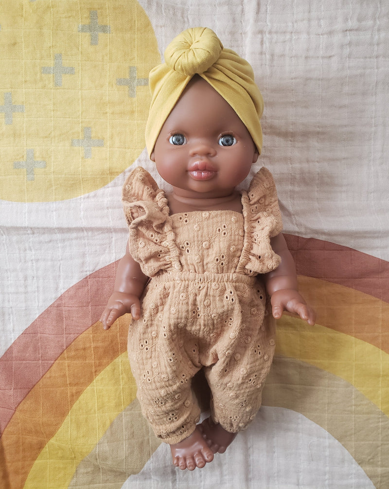 minikane black baby girl with blue eyes