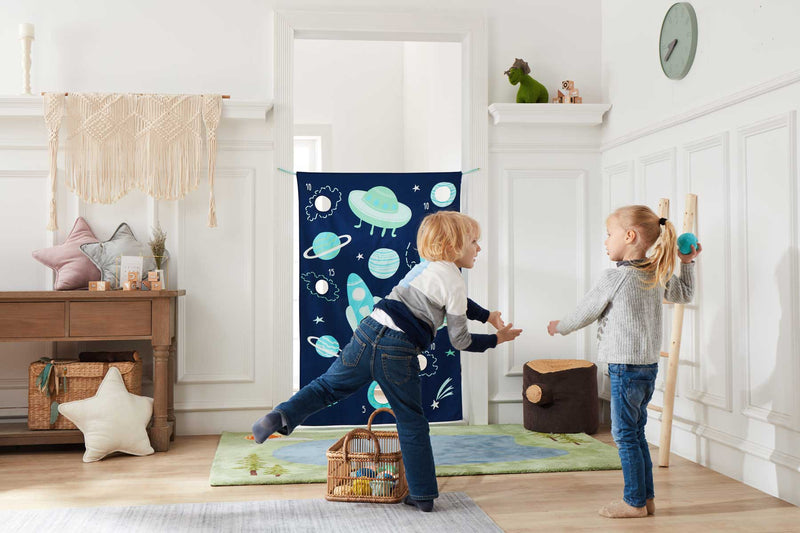 Indoor beanbag throwing game for kids with outerspace theme