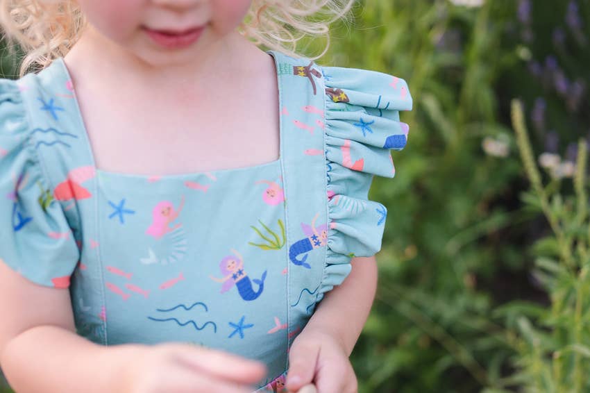 Emmy Romper in Mermaid romper Ollie Jay   